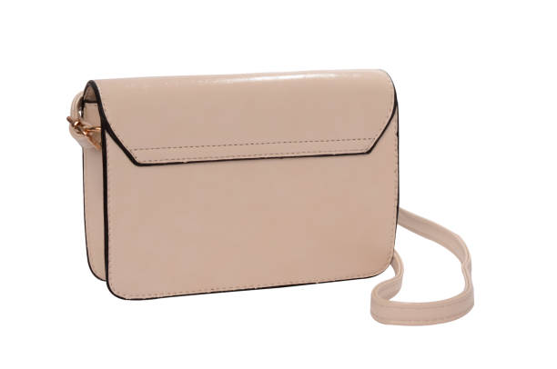 istock Beige lacquered clutch isolated on white 666379394
