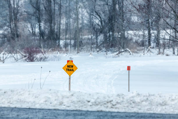 istock New Trail Snowmobiling Road Sign in Rural Western NY State 666383876