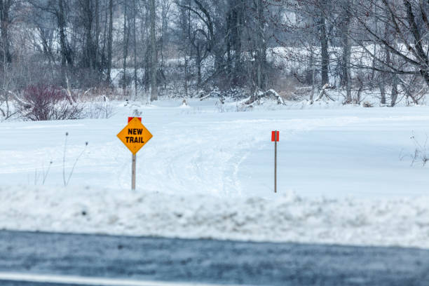 istock New Trail Snowmobiling Sign in Rural Western NY State 666384080