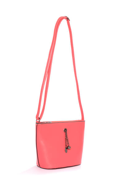 istock Pink leather clutch isolated on white 666386798