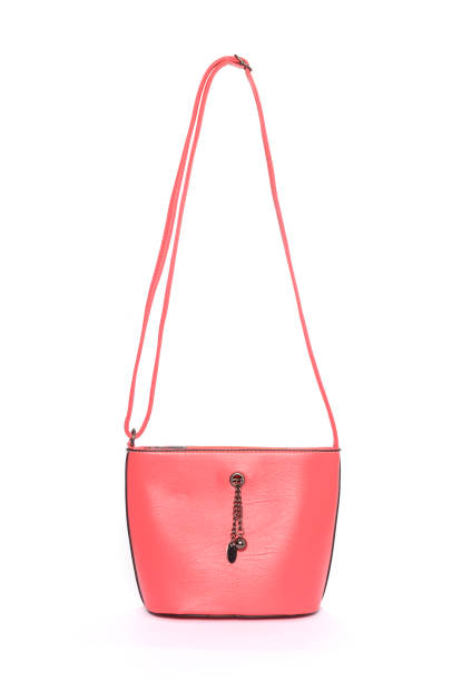 istock Pink leather clutch isolated on white 666386804