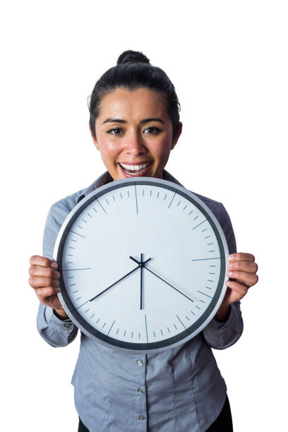 happy woman showing her large clock - clock clock face blank isolated imagens e fotografias de stock