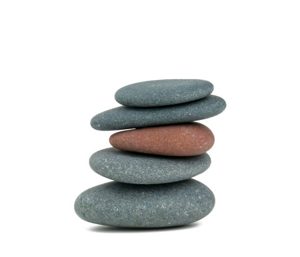 istock pyramid of stones isolated on white 666391764