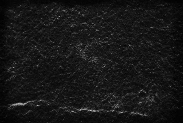 istock Black stone pattern texture background, Detailed of real genuine stone from nature. 666393550