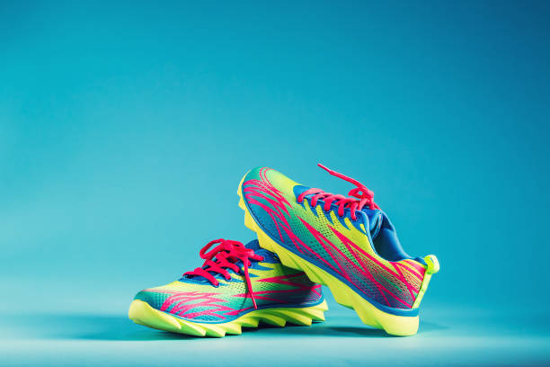 istock Colorful running sneakers on a blue background 666393966