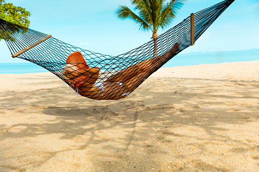 Woman Relax in beach hammock