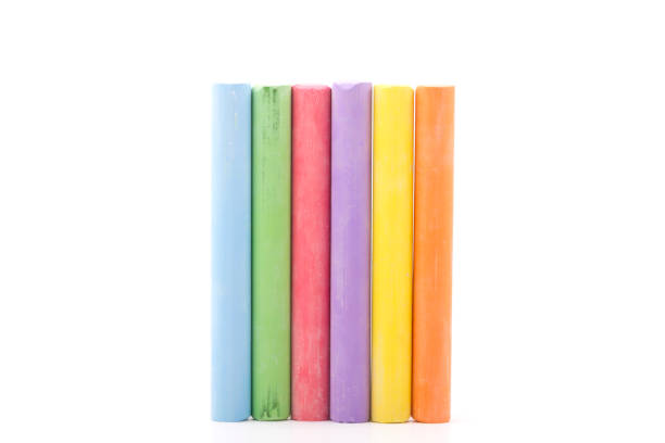 istock Closeup of colorful chalks isolated on white. 666473430