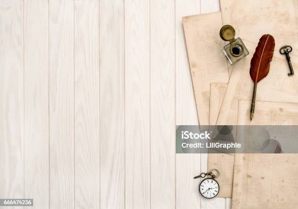 Used Paper Sheets Vintage Office Supplies Wooden Table Stock Photo - Download Image Now