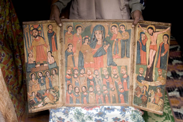 Colourful biblical painting LALIBELA, ETHIOPIA - 28 AUGUST 2007 - A painting inside a rock hewn church. UNESCO have now taken over responsibilities of all Lalibela churches so its arts and artifacts are safe for centuries to come. the church of saint george lalibela ethiopia stock pictures, royalty-free photos & images