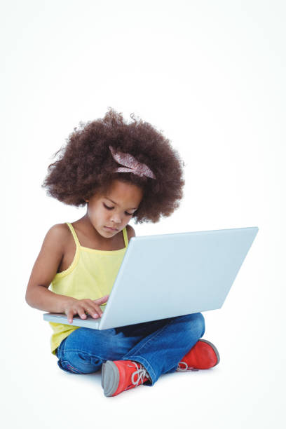 istock Cute girl sitting on floor using laptop 666480696
