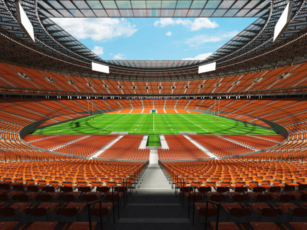 istock 3D render of a round rugby stadium with orange seats and VIP boxes 666483684