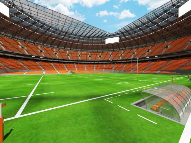 istock 3D render of a round rugby stadium with orange seats and VIP boxes 666483708
