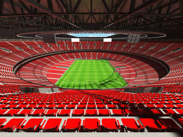istock 3D render of a round rugby stadium with  red seats and VIP boxes 666483764