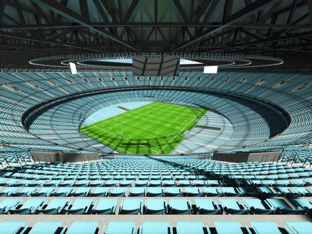istock 3D render of a round rugby stadium with  sky blue seats and VIP boxes 666483804