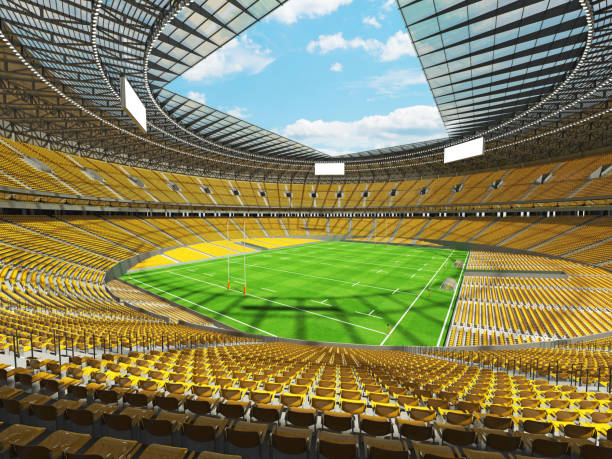 istock 3D render of a round rugby stadium with  yellow seats and VIP boxes 666483872