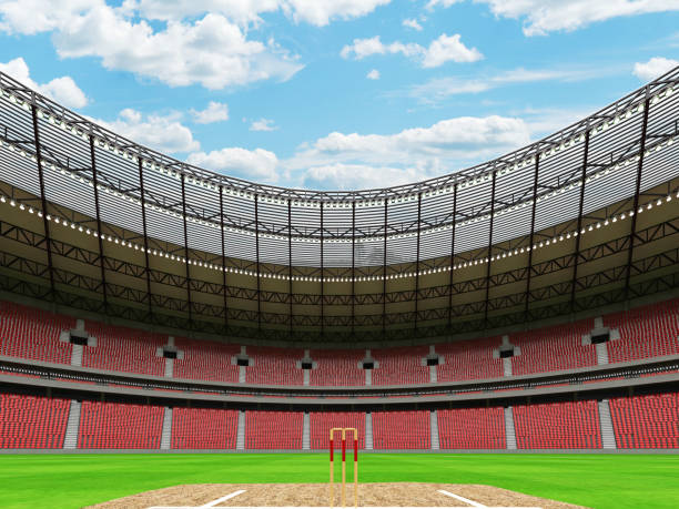 istock 3D render of a round cricket stadium with red seats and VIP boxes 666486510