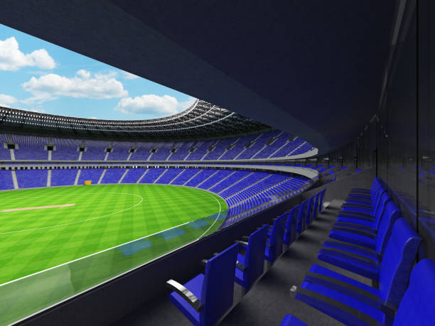 istock 3D render of a round cricket stadium with blue seats and VIP boxes 666486530