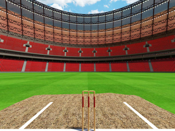 istock 3D render of a round cricket stadium with red seats and VIP boxes 666486544
