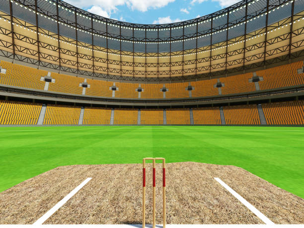 istock 3D render of a round cricket stadium with yellow  seats and VIP boxes 666486614