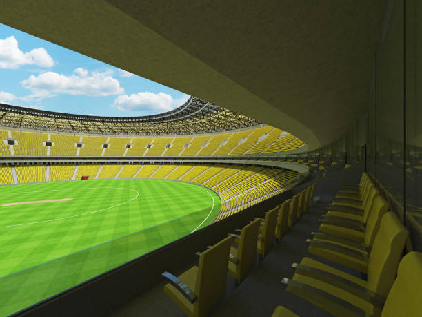 istock 3D render of a round cricket stadium with bright yellow  seats and VIP boxes 666486680