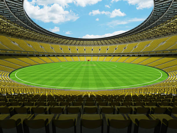 istock 3D render of a round cricket stadium with bright yellow  seats and VIP boxes 666486682