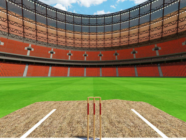 istock 3D render of a round cricket stadium with orange seats and VIP boxes 666486764