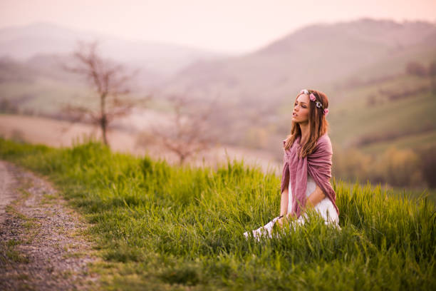 istock woman in nature 666489938
