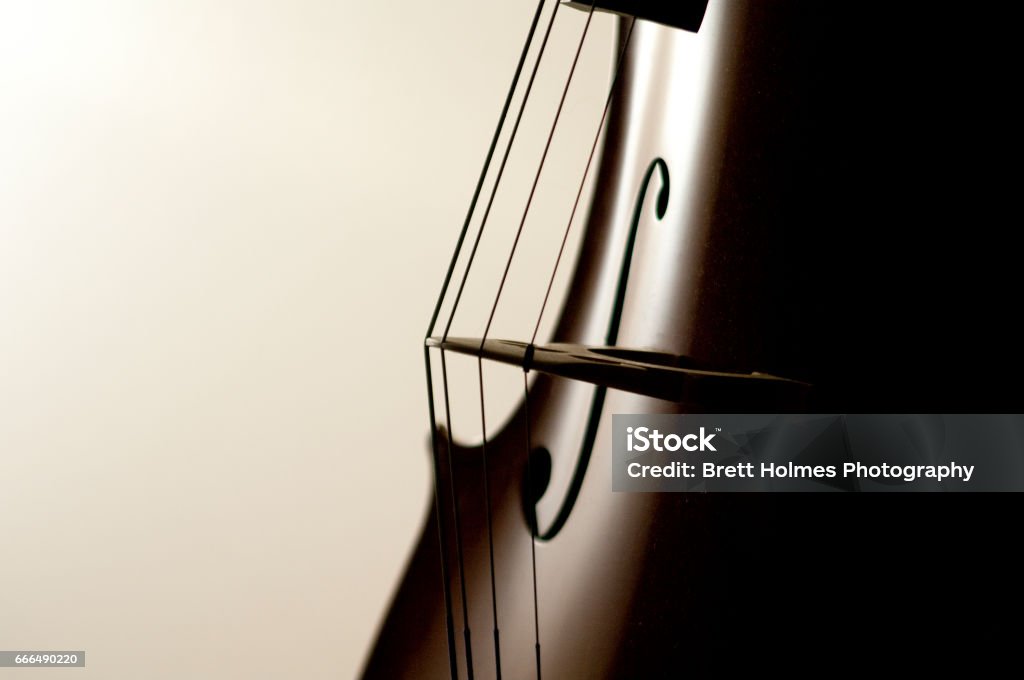 Cello strings Close up of a cello and its strings Musical Instrument Stock Photo