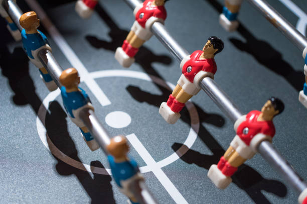 istock Table football kicker with miniature players 666500254