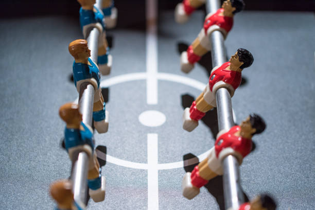 istock Table football kicker with miniature players 666503770