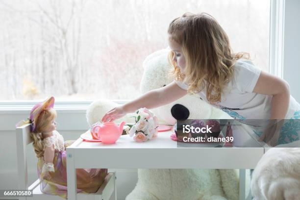 A Little Girl Having A Tea Party Stock Photo - Download Image Now - Doll, Girls, Child