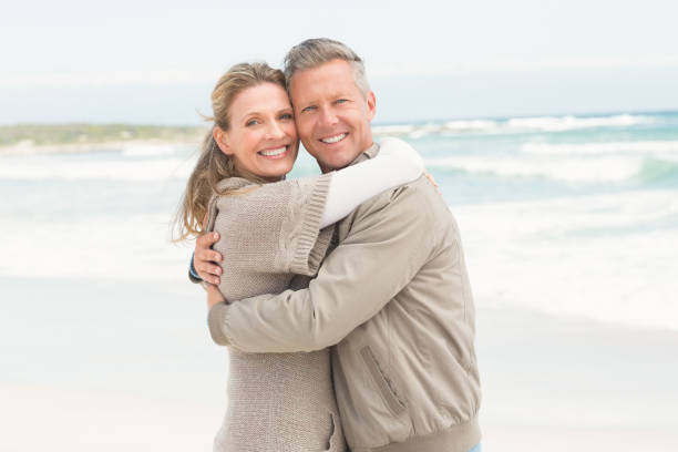 istock Happy couple holding each other 666516528