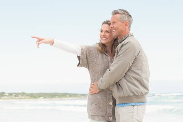 istock Smiling couple holding one another 666516728