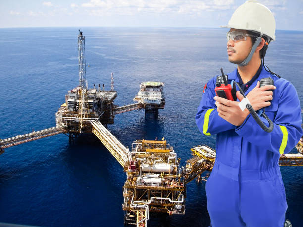 istock Working engineer at offshore oil and gas refinery 666517338