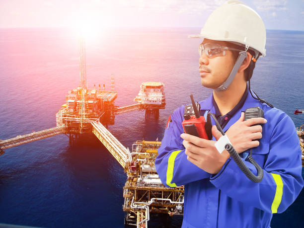 istock Working engineer at offshore oil and gas refinery 666517340