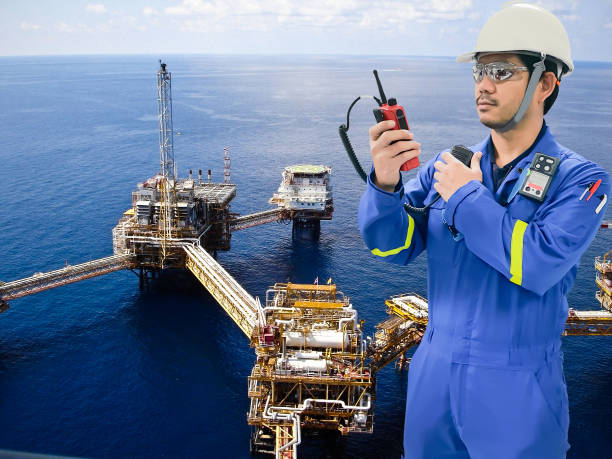 istock Working engineer at offshore oil and gas refinery 666517350