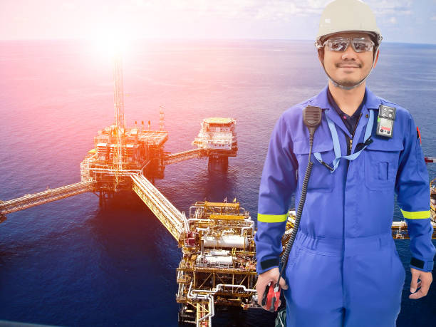 istock Working engineer at offshore oil and gas refinery 666517354