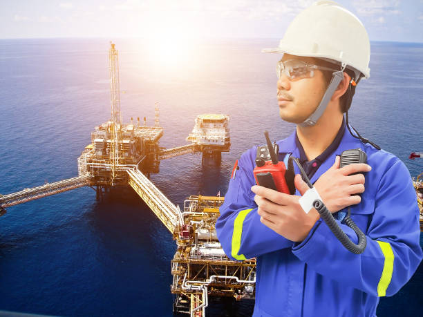 istock Working engineer at offshore oil and gas refinery 666517356