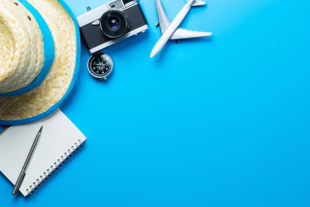 istock Summer Travel accessories on blue background copy space 666521264