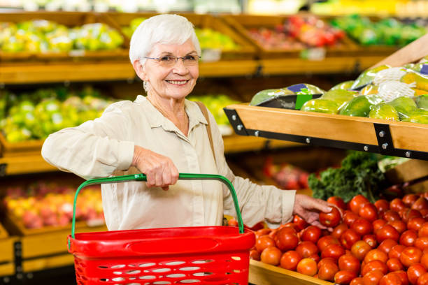 istock Senior woman picking out some vegetables 666526454