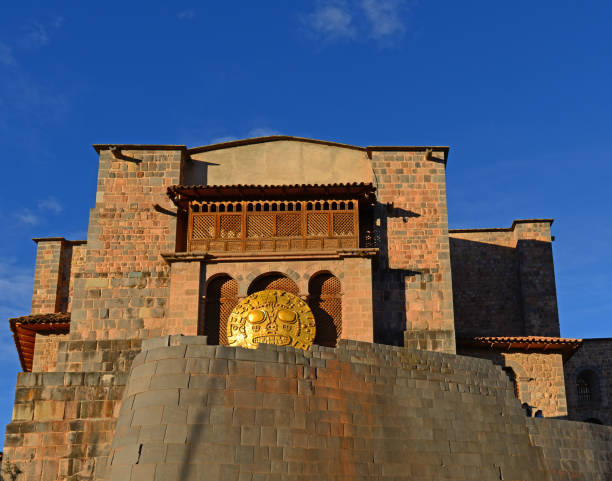 Qorikancha Temple Facade of the Qorikancha temple or "Temple of the Sun" with solar disc (during the Inti Raymi festival) as well as the Santo Domingo convent in Cusco, Peru. inti raymi stock pictures, royalty-free photos & images