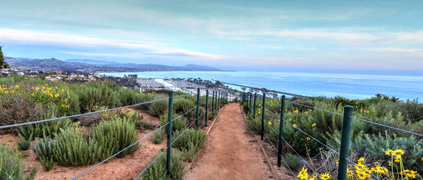 istock Hiking trail above Dana Point city view at sunset 666533040