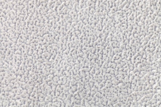istock Light gray fluffy background of soft, fleecy cloth. Texture of textile closeup. 666533116
