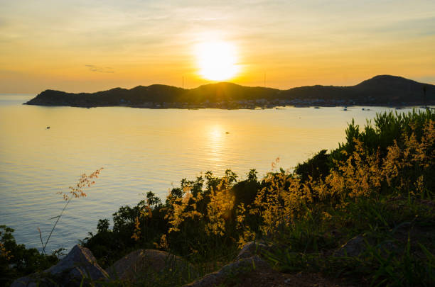 istock Sun rises over Binh Hung island, Cam Ranh, Vietnam 666536850
