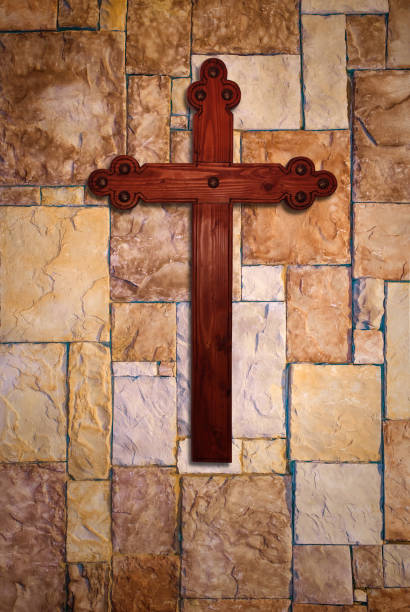 istock Christian cross hanging on the wall 666542682