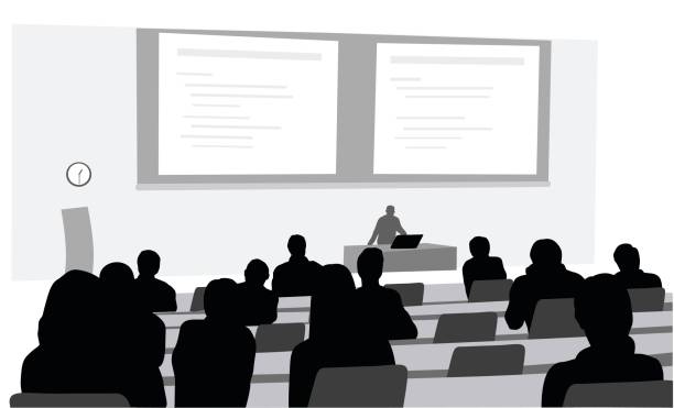 Lecture Room A vector silhouette illustration of a lecture hall in a university setting with a professor giving a lecture at the front of the room in front of a computer and behind a projection of a power point.  Students listen intently. lecture hall illustrations stock illustrations