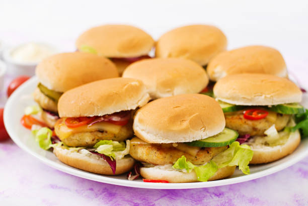istock Mini hamburgers with chicken burger, cheese and a vegetables 666552092