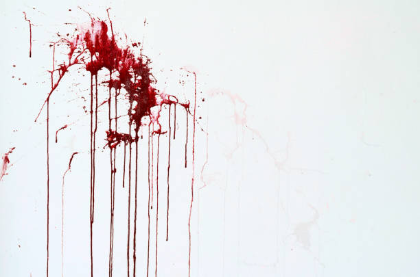istock Background texture cement white wall with red blood-like paint streaks 666552438