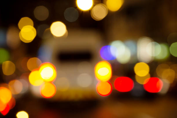 Blured car lights on busy night street. Long Street, Cape Town, South Africa