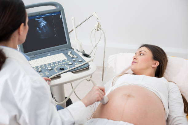 istock Pregnancy ultrasound in doctors office 666556366